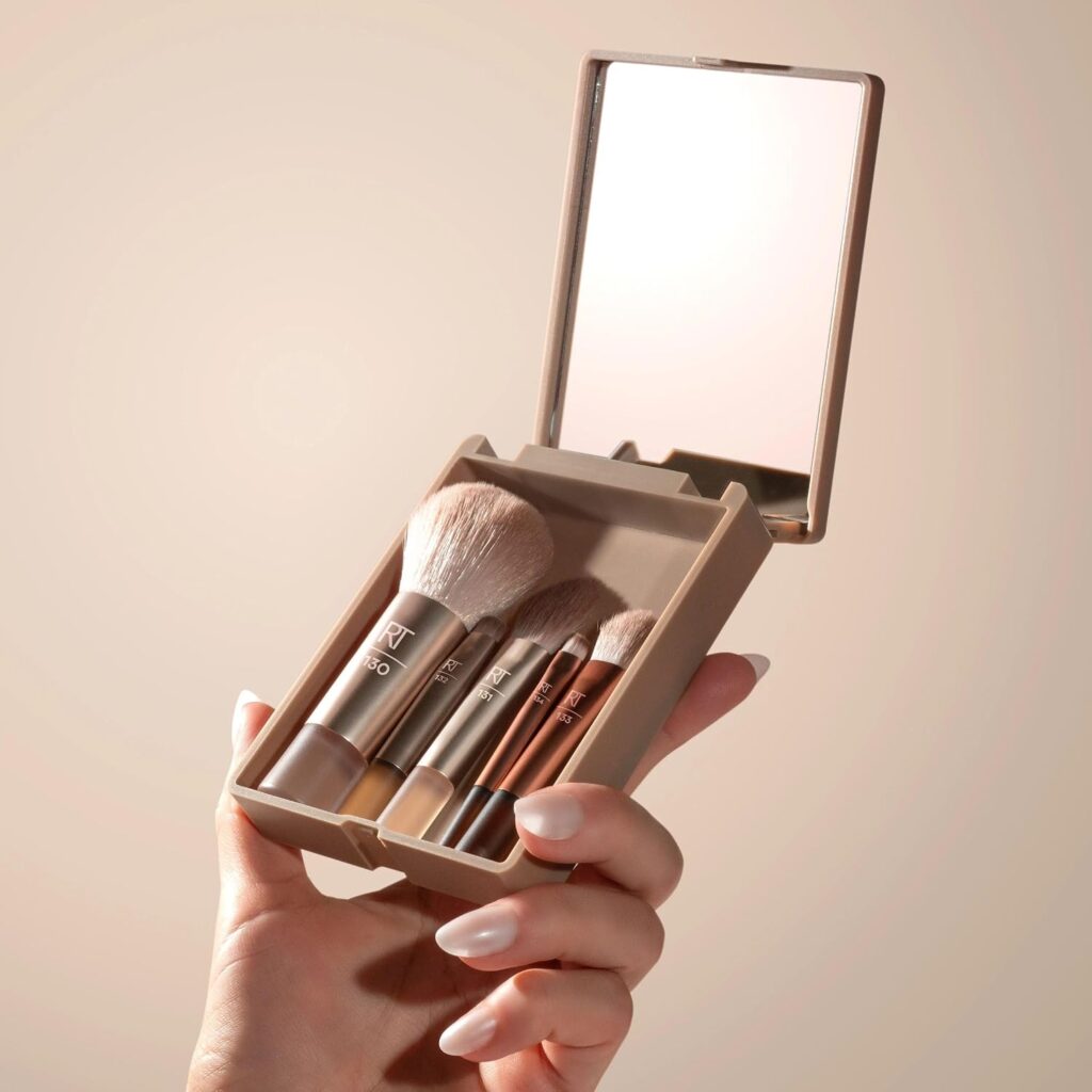 Real Techniques New Nudes On The Glow Mini Brush Kit travel-friendly cruelty-free makeup brush set with compact mirror